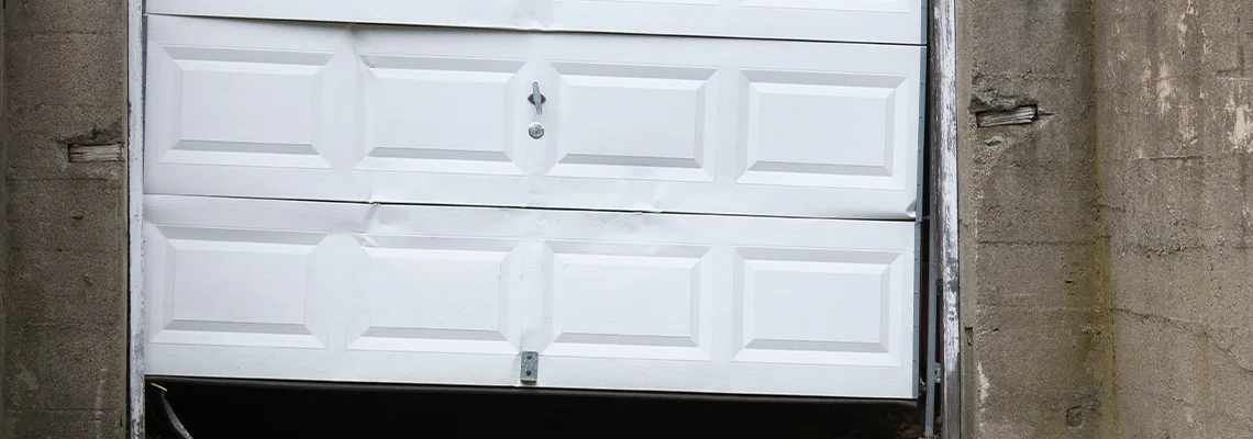 Garage Door Got Hit By A Car Dent Removal in Carol Stream, IL