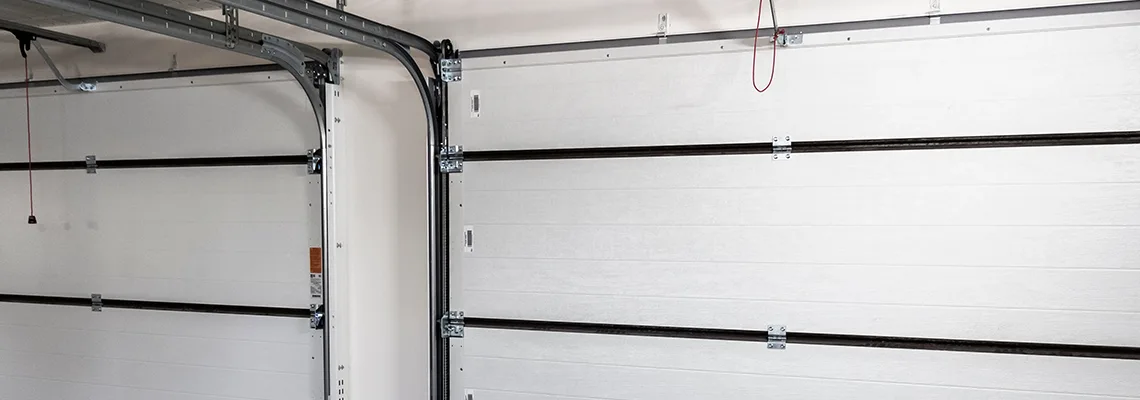 Fix Folding Garage Door Jerking in Carol Stream, Illinois